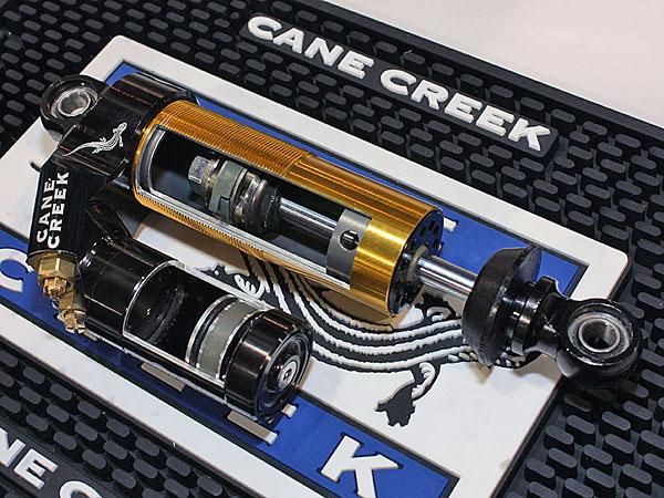 Cane Creek has revised its Double Barrel rear shock with more linear-feeling adjusters, smoother Norglide bushings and a new bottom-out bumper that yields an extra 3mm of shock stroke than before.