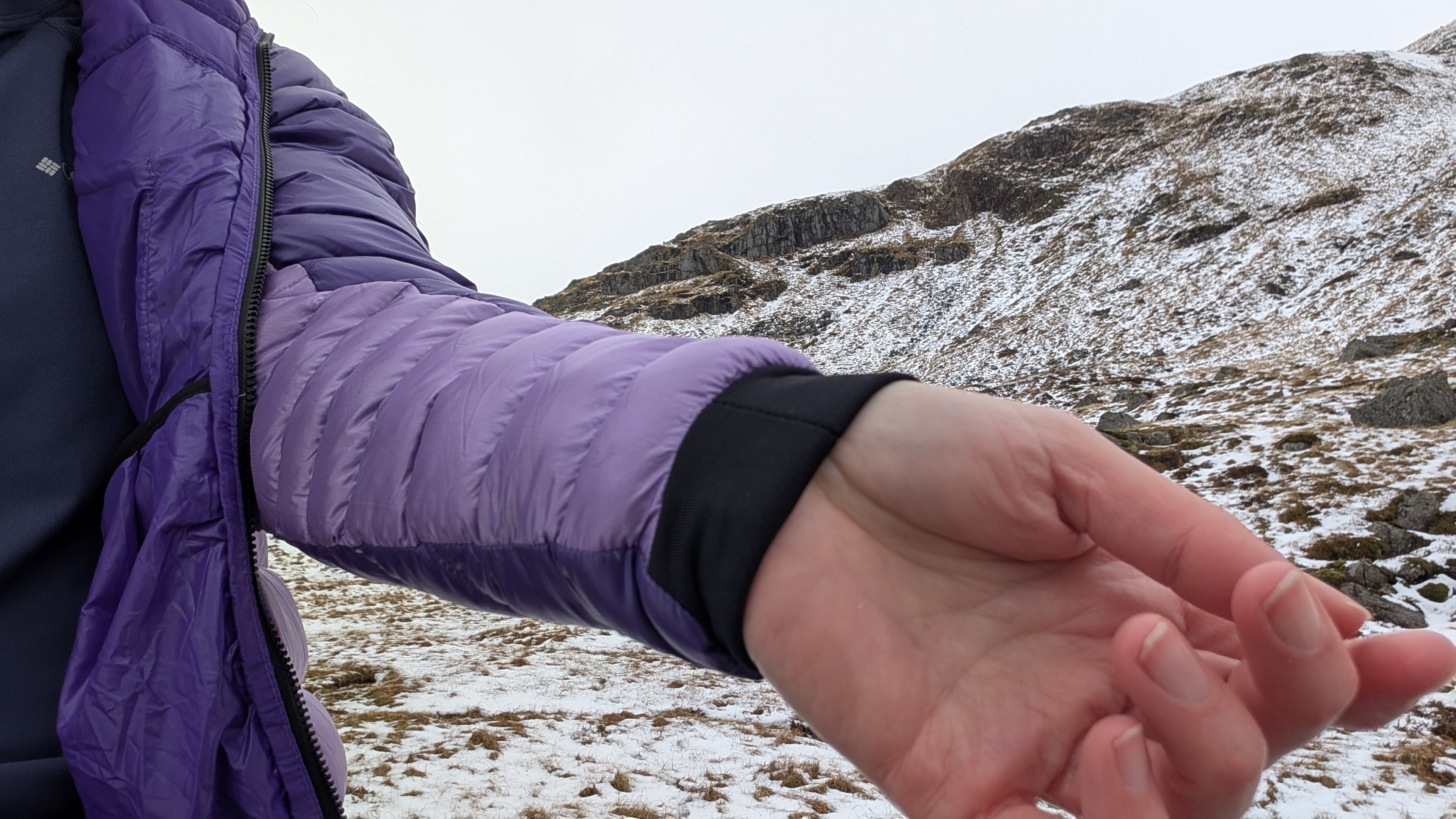 Close up of the cuff on a purple North Face Summit Breithorn Down Jacket