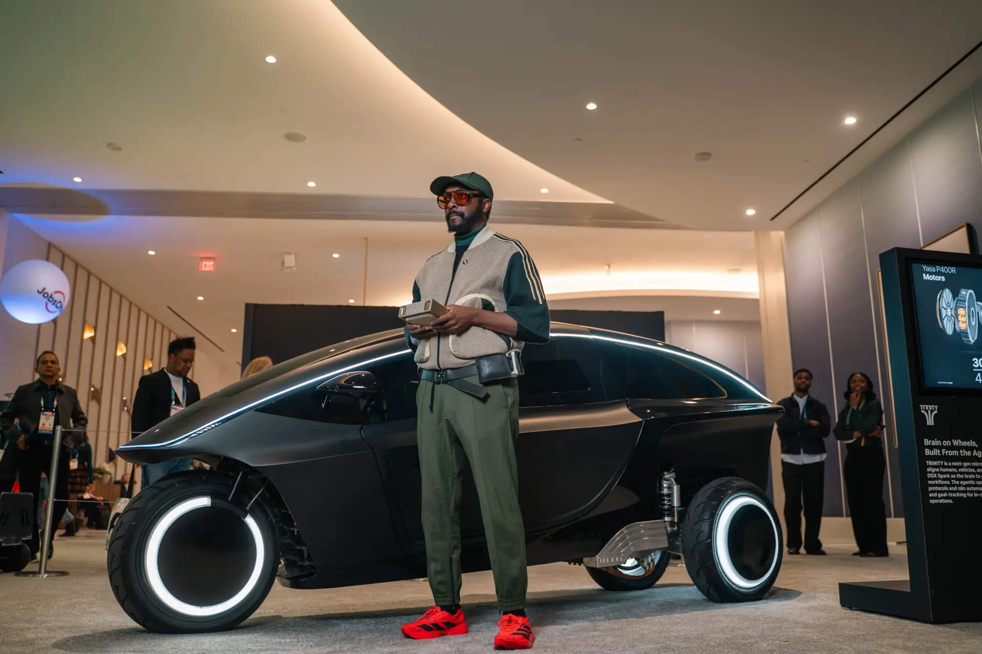 will.i.am and the Trinity 3-wheeler at Nvidia's CES 2026 Showcase