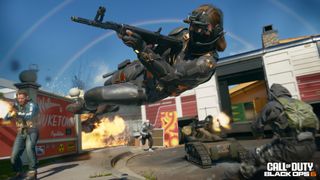 A render of the new Nuketown map in Call of Duty: Black Ops 6 showing an operator jumping through the air sideways while aiming. 