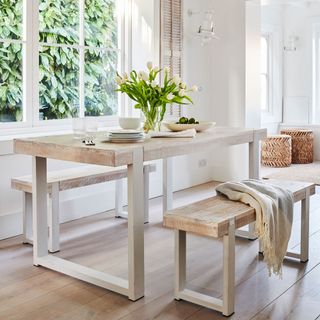 dining room with wooden table and floor