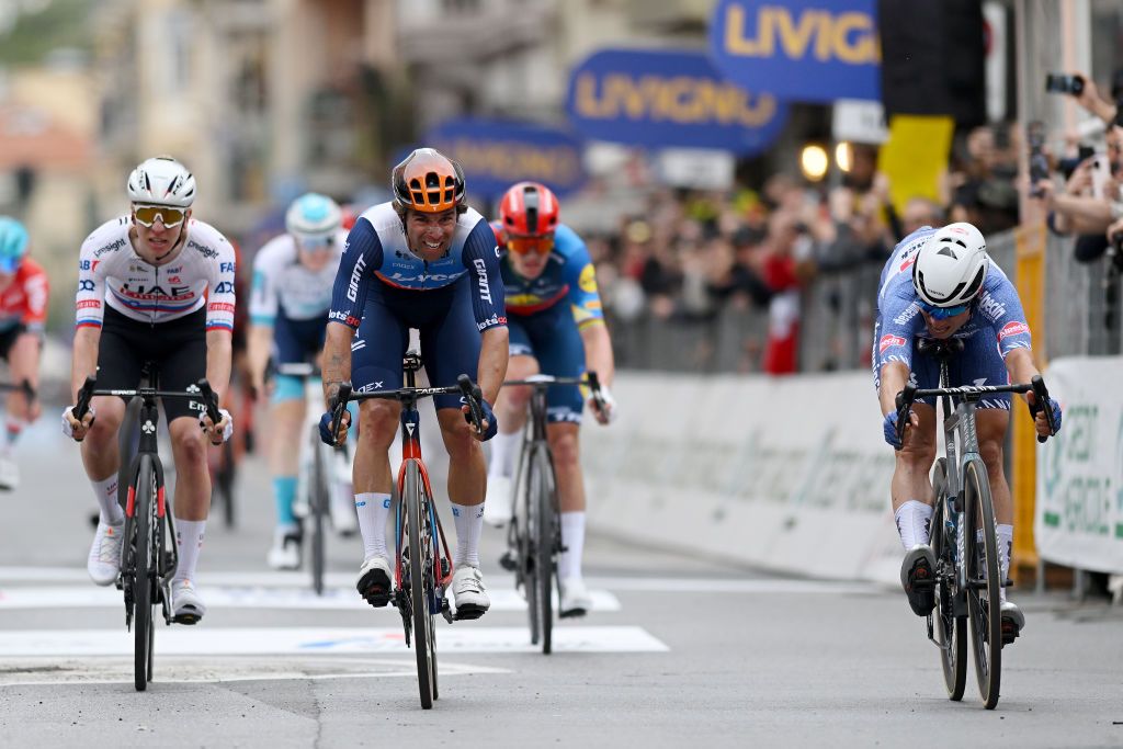 Jasper Philipsen winning Milano-Sanremo ahead of Michael Matthews and Tadej Pogačar