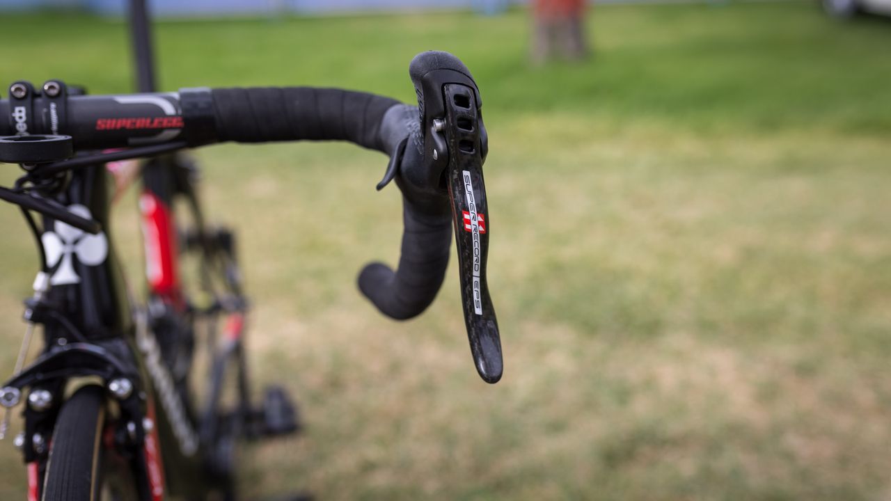 Campagnolo's Super Record levers feature the famous curves and a clear lacquered carbon finish