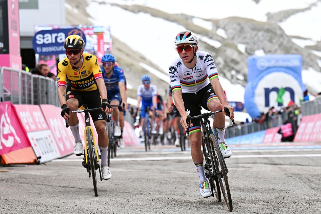 GRAN SASSO DITALIA CAMPO IMPERATORE ITALY MAY 12 LR Primo Rogli of Slovenia and Team JumboVisma and Remco Evenepoel of Belgium and Team Soudal Quick Step cross the finish line during the 106th Giro dItalia 2023 Stage 7 a 218km stage from Capua to Gran Sasso dItalia Campo Imperatore 2123m UCIWT on May 12 2023 in Gran Sasso dItalia Campo Imperatore Italy Photo by Stuart FranklinGetty Images