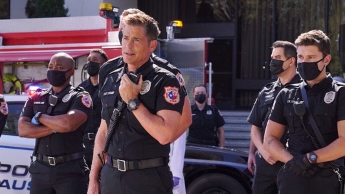 Brian Michael Smith as Paul Strickland, Rob Lowe as Captain Owen Strand and Ronen Rubinstein as T.K. Strand in 9-1-1: Lone Star.