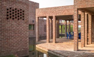 covered brick colonnades at Friendship Hospital in Bangladesh by Kashef Chowdhury/Urbana