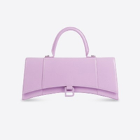 SPEND: Balenciaga Hourglass Stretched top handle bag
The latest offering from Balenciaga, a 'stretched' version of the original top handle bag, it comes with a removable crossbody leather strap so can be worn over the shoulder or used as a clutch.