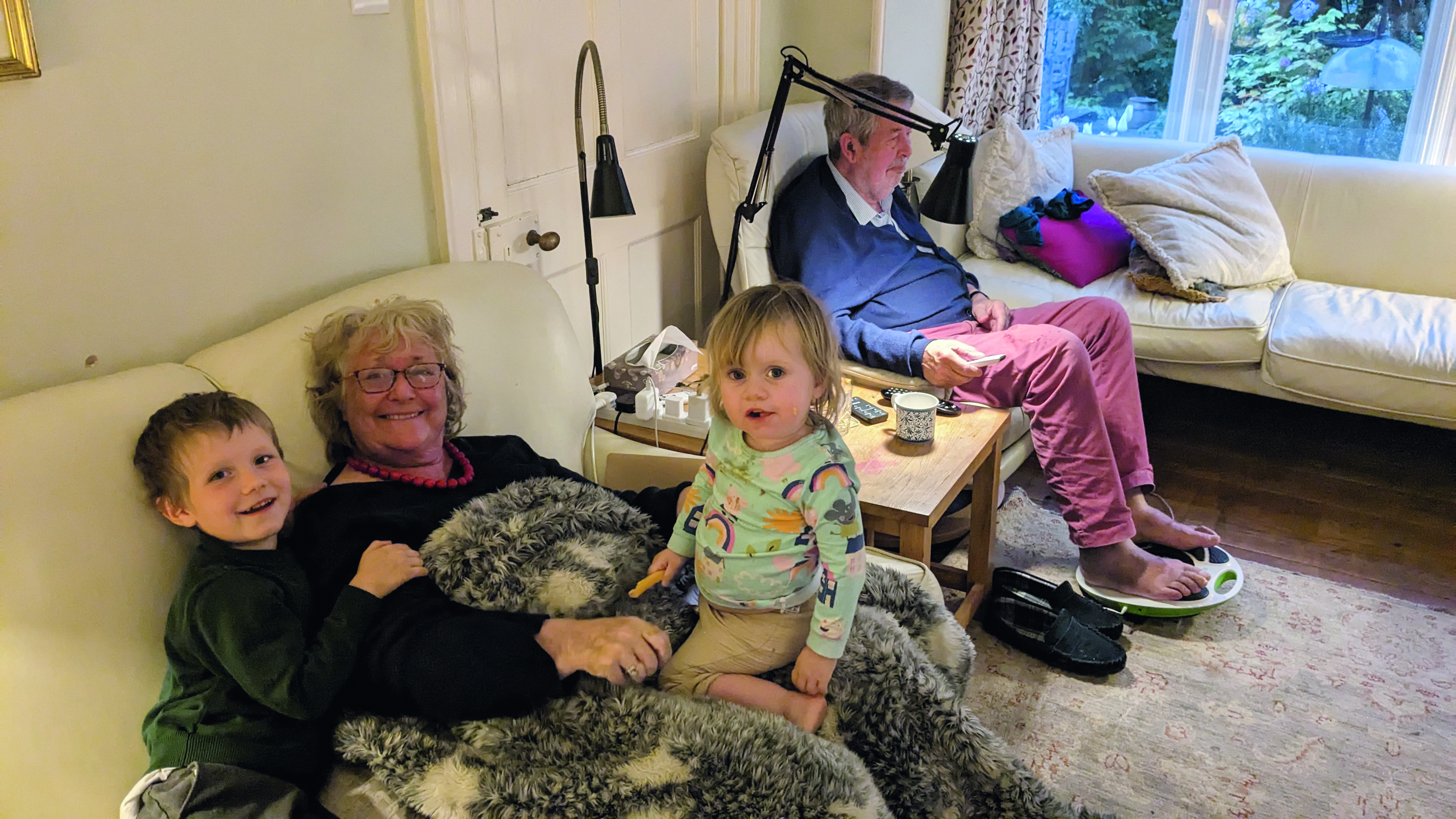 Katie Fforde with husband and grandchildren