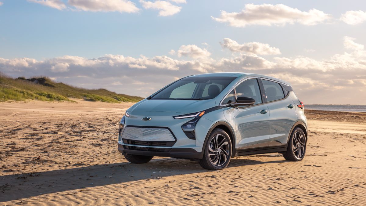 Chevrolet Bolt parked on a beach on a sunny day