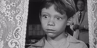 Billy Mumy in the foreground in The Twilight Zone
