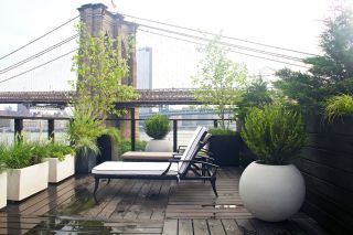 rooftop deck with spherical planters by Amber Freda