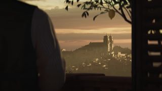 Mafia The Old Country: a screenshot of a man looking out at a town in Italy during the trailer for the upcoming Mafia game.