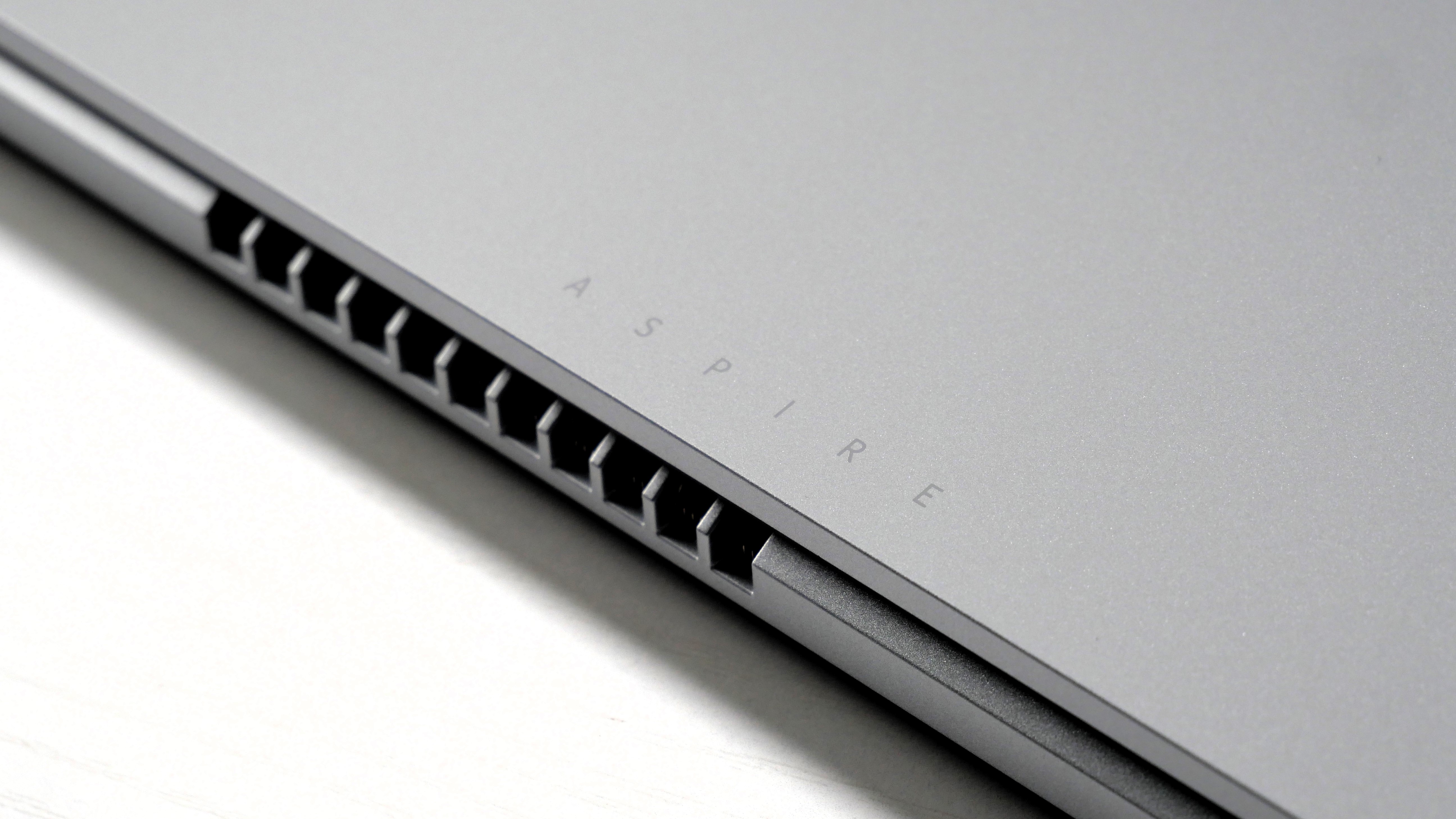 Acer Aspire 3 15 laying flat on a table, highlighting the Aspire logo.