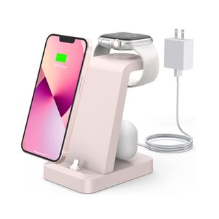 A desk charger with a phone and charger