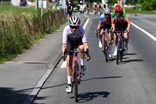 CHAMPAGNE SWITZERLAND JUNE 18 Neve Bradbury of Australia and Team CanyonSram Racing White Best Young Rider Jersey attacks during the 4th Tour de Suisse Women 2024 Stage 4 a 1275km stage from Champagne to Champagne UCIWWT on June 18 2024 in Champagne Switzerland Photo by Tim de WaeleGetty Images