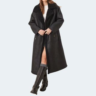 Image of woman wearing black coat