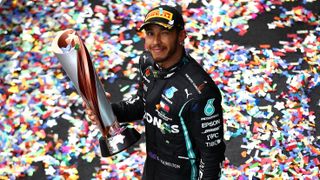 Lewis Hamilton of Great Britain and Mercedes GP celebrates winning in Turkey.