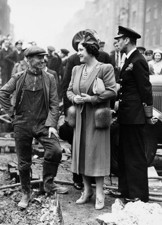 The Queen Mother and George VI with civilians during WW2