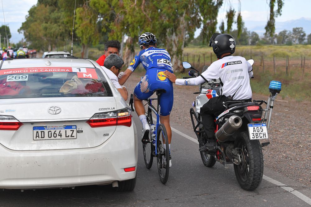 Alvaro Hodeg gets medical attention for injuries suffered in an early crash