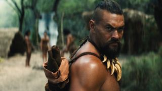 Jason Momoa looks over his shoulder in a scene from Apple TV Plus' "Chief of War"