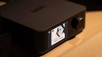 Presto Music streaming on a WiiM streamer on a wooden counter