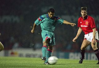 Brazilian striker Rom?rio de Souza Faria, known as Romario, playing for Spanish club FC Barcelona in a Champions League group stage match against Manchester United at Old Trafford, October 1994.