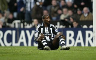 NEWCASTLE, ENGLAND - JANUARY 19: Shola Ameobi of Newcastle after being upended in the Bolton penalty box during the Barclays Premier match between Newcastle United and Bolton at St James' Park , Newcastle on January 19, 2008 in Newcastle, England. (Photo by Ian Horrocks/Newcastle United via Getty Images)