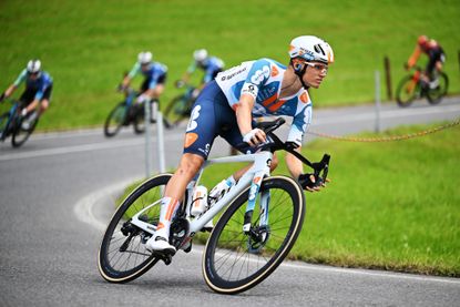 Oscar Onley riding for dsm-firmenich PostNL