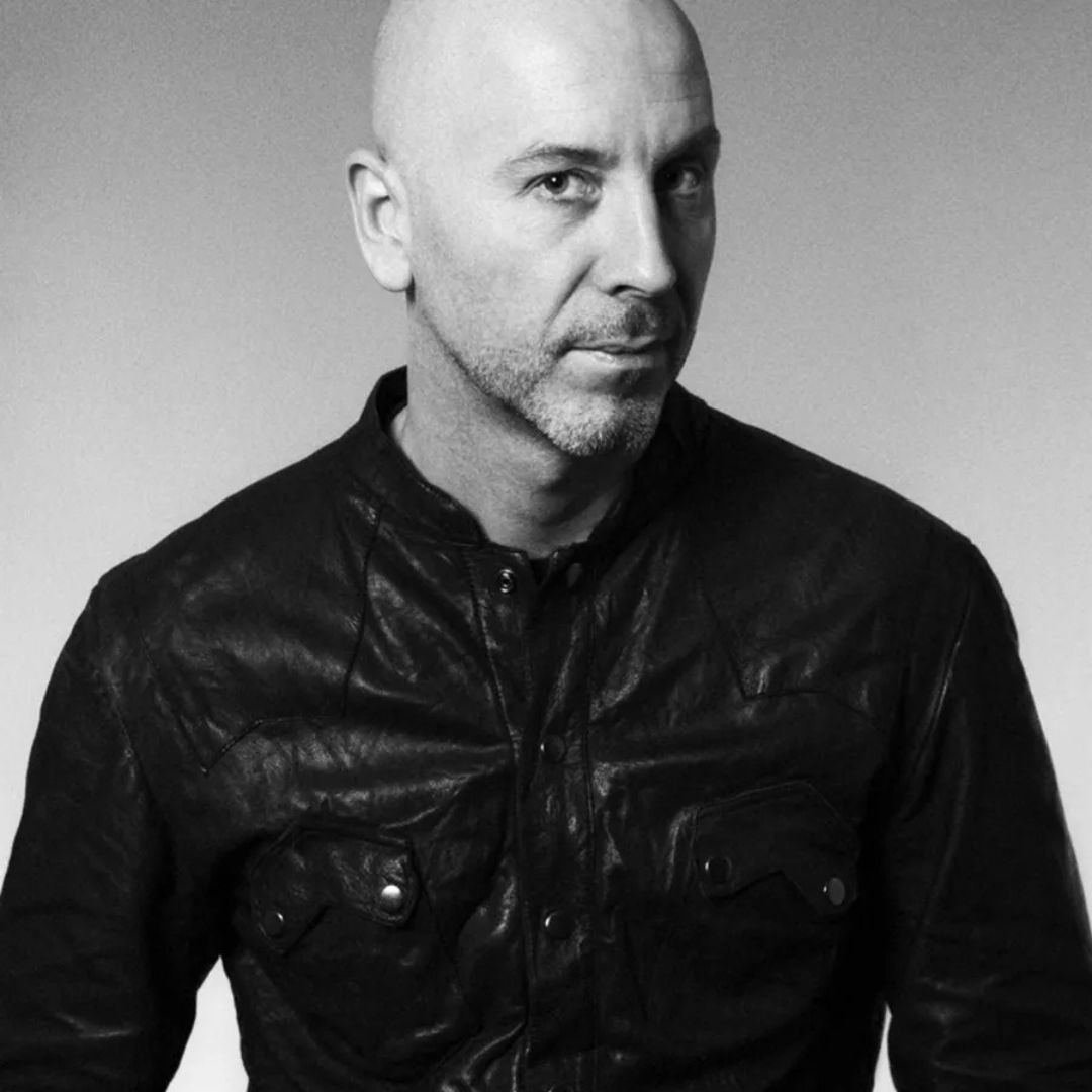 an image of terry barber, in a black and white, wearing a leather jacket