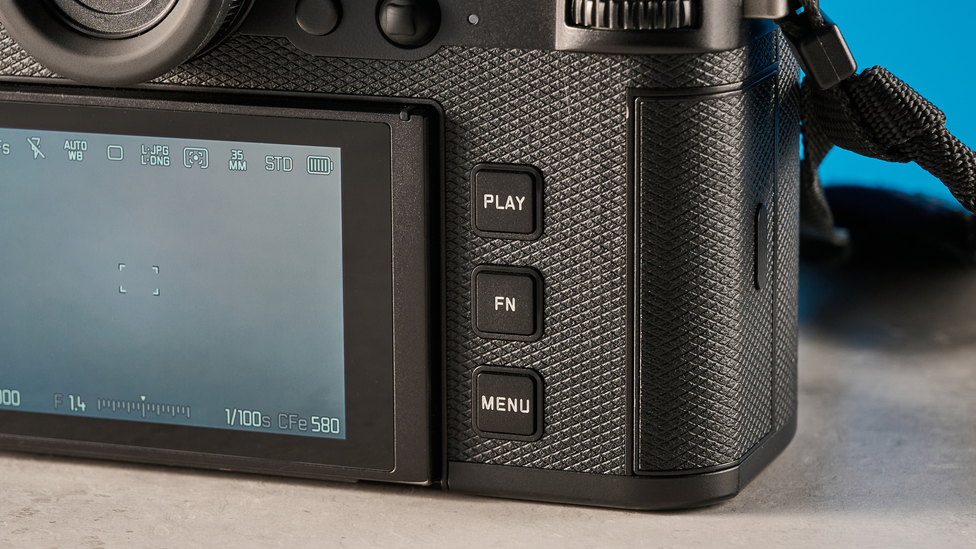 A black Leica SL3 mirrorless full frame camera