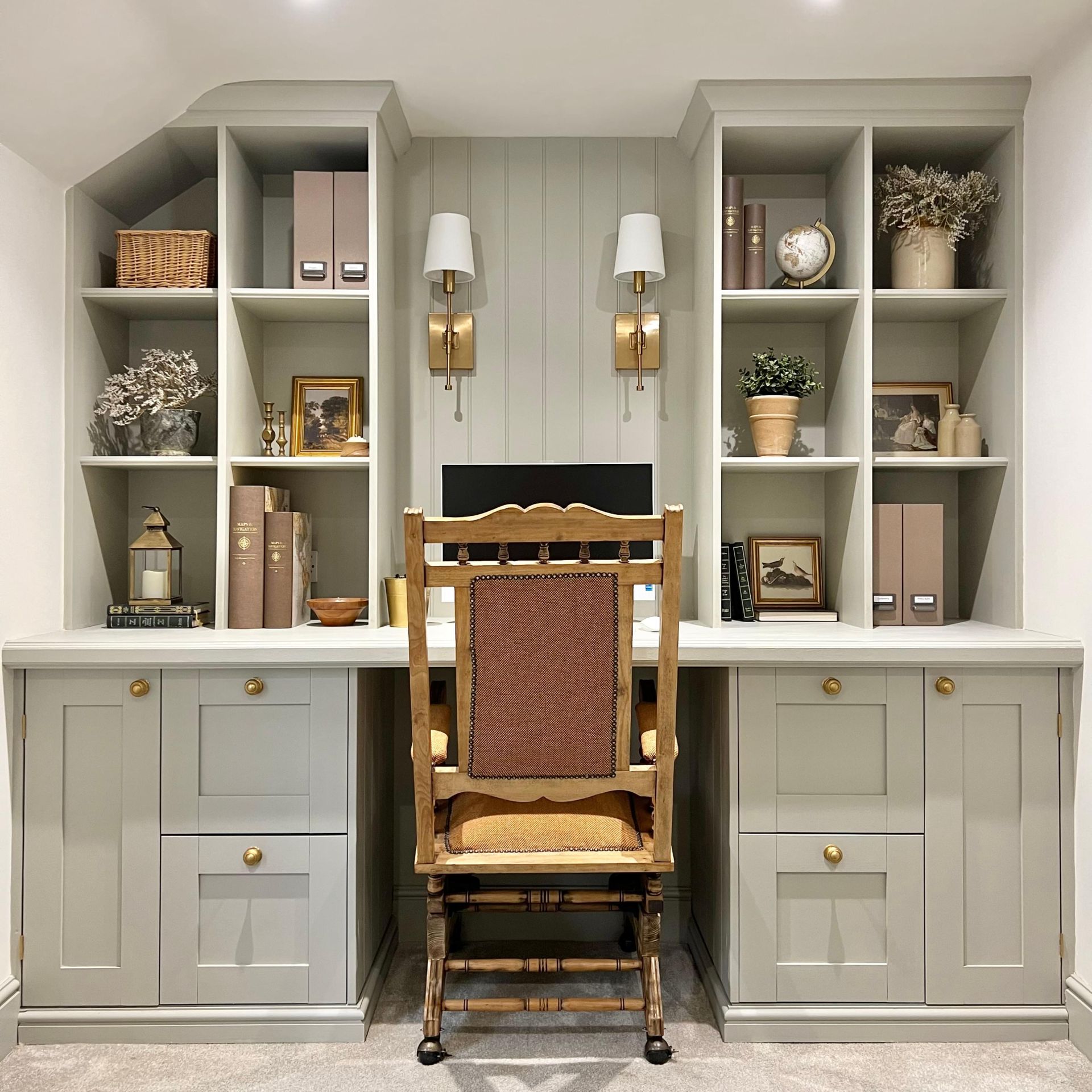 Light blue painted study, shelving, desk, chair