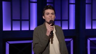 Michael Longfellow performing stand up on Conan