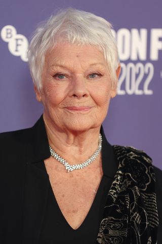 Judi Dench is pictured with grey hair whilst attending the "Allelujah" European Premiere during the 66th BFI London Film Festival at Southbank Centre on October 09, 2022 in London, England.