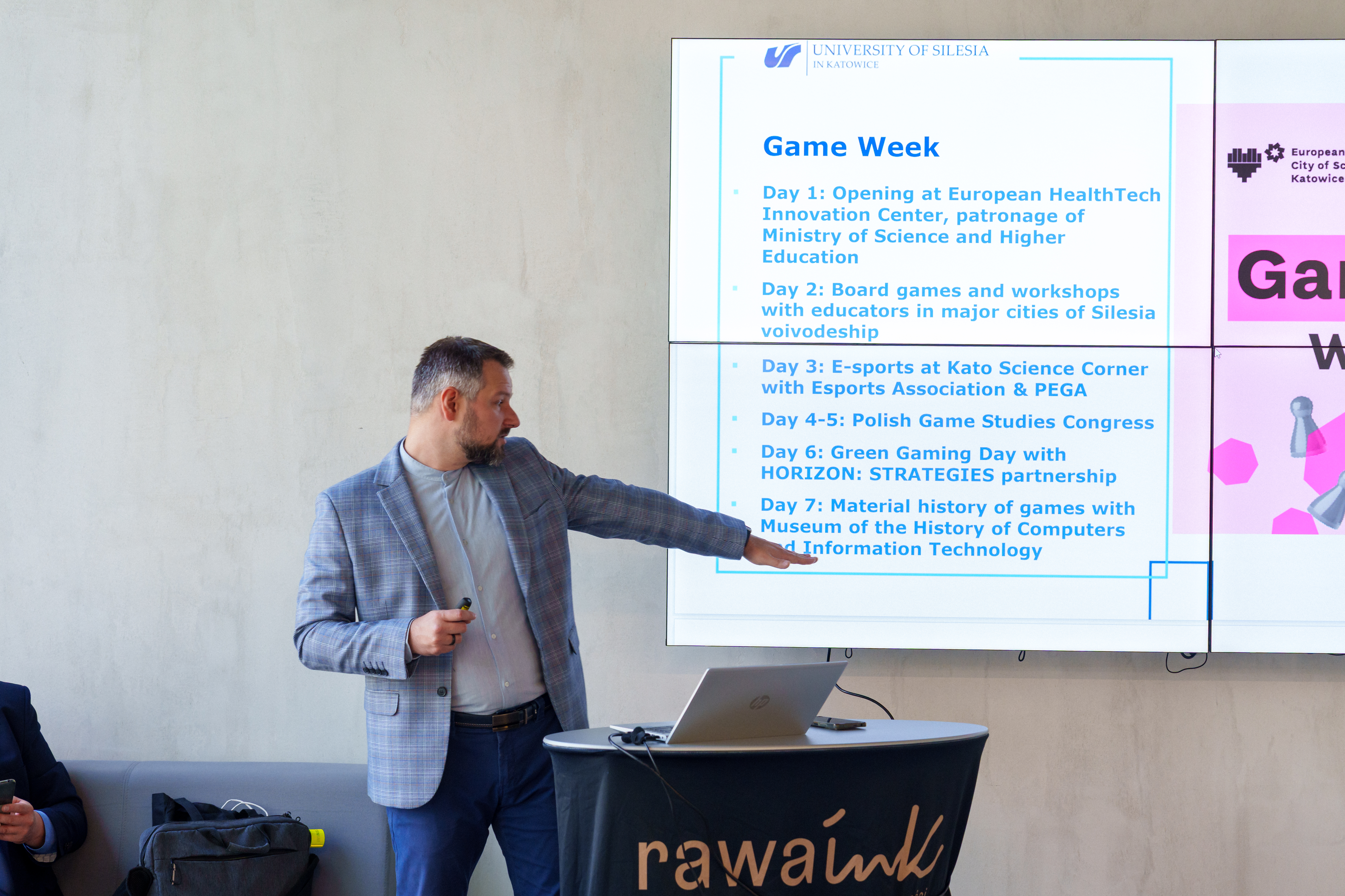A representative from the University of Silesia's gaming faculty giving a lecture in Katowice