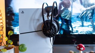 Meze 105 AER wired headphones being used with a PS5 Slim