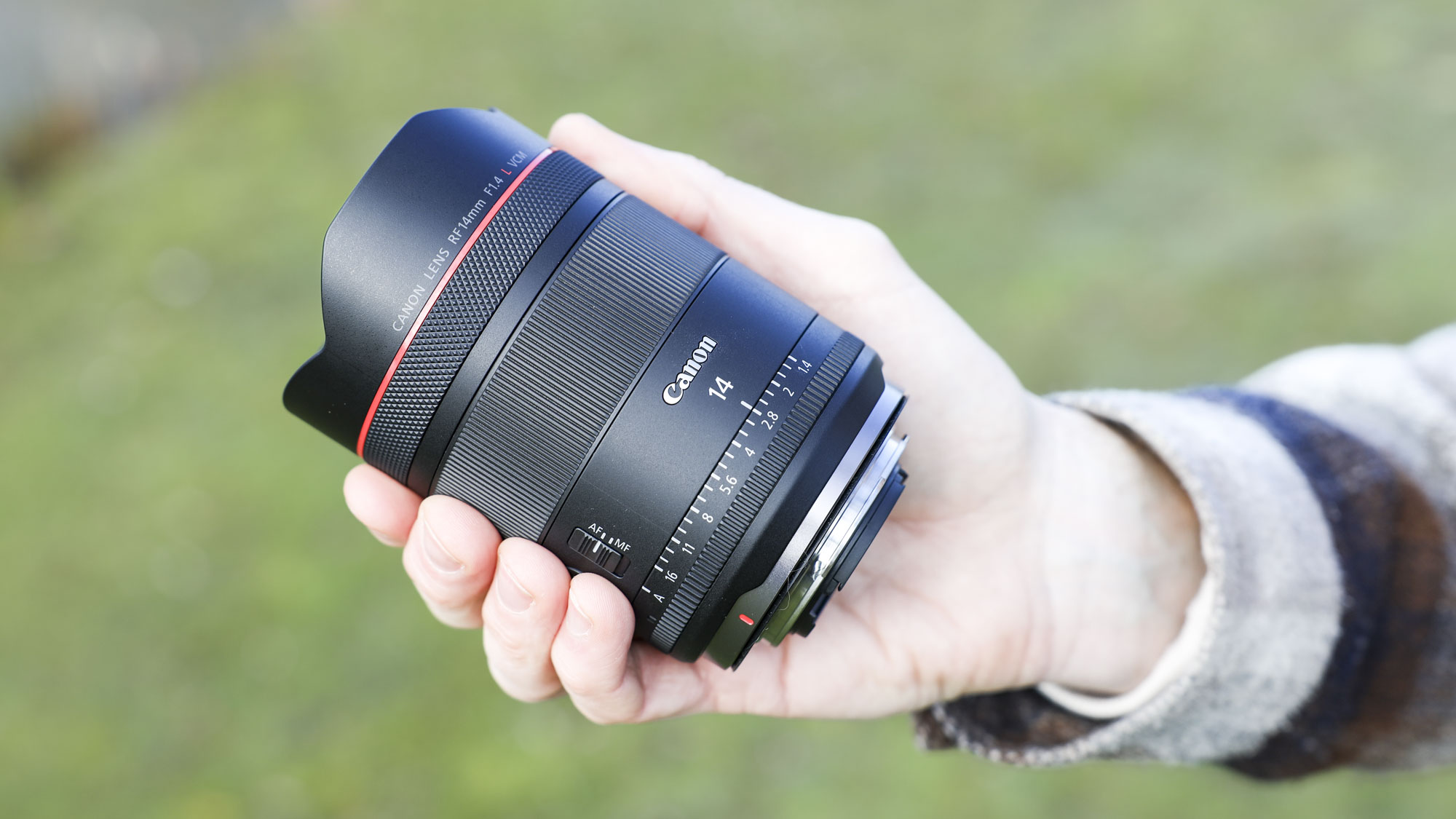 Canon RF 14mm F1.4L VCM lens in photographer Tim Coleman's hands