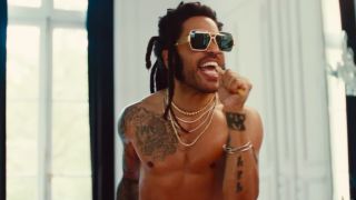 Lenny Kravitz singing with a toothbrush in TK421 music video