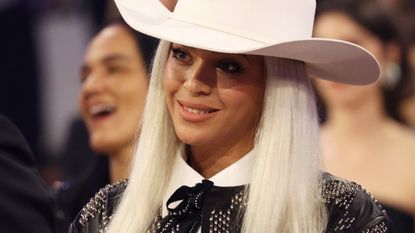 Beyonce wearing a cowboy hat while watching the 2024 Grammy Awards.