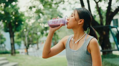 Woman drinking a protein drink