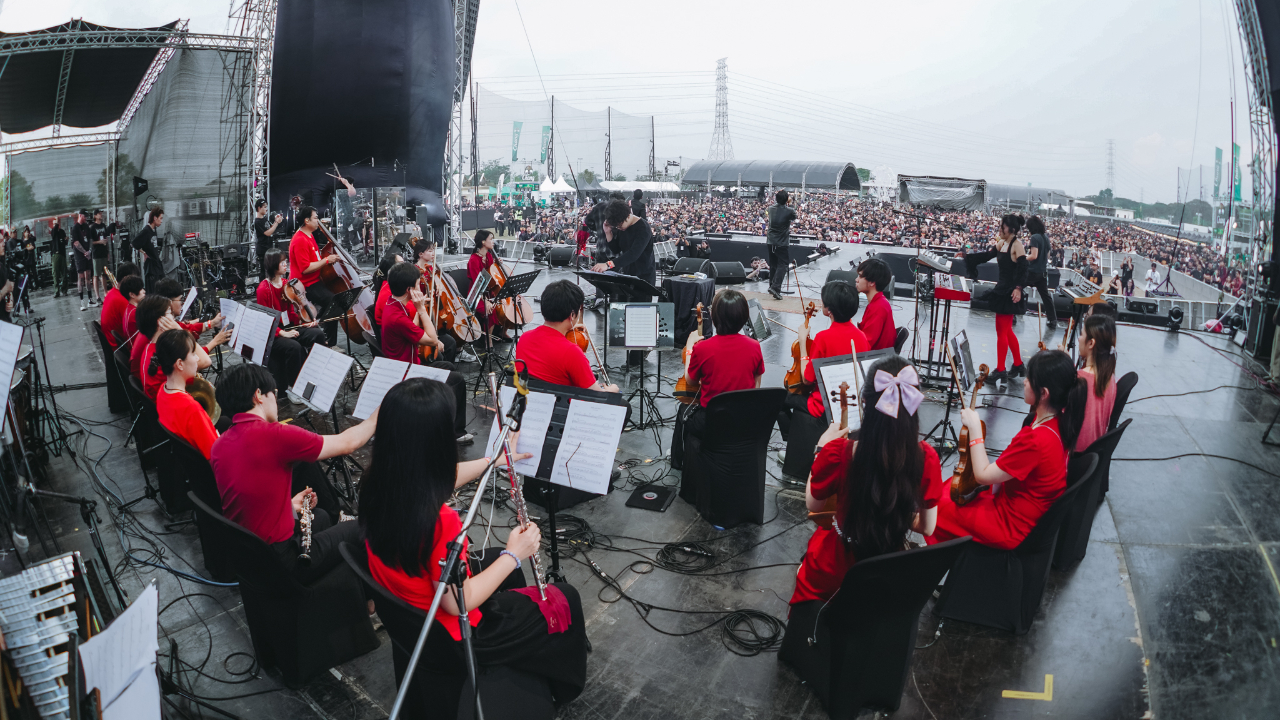 Defying Decay on stage at Rock Alarm with an orchestra