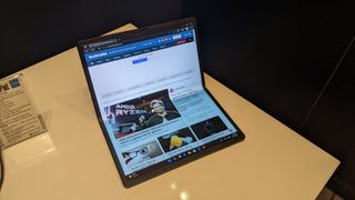 Lenovo ThinkPad X1 Fold Gen 2 pre-production test unit pictured on a white desk.