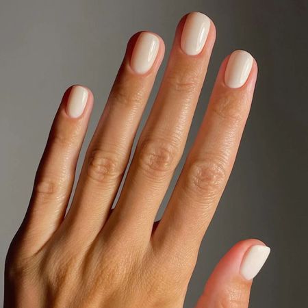 Off-white nail polish.