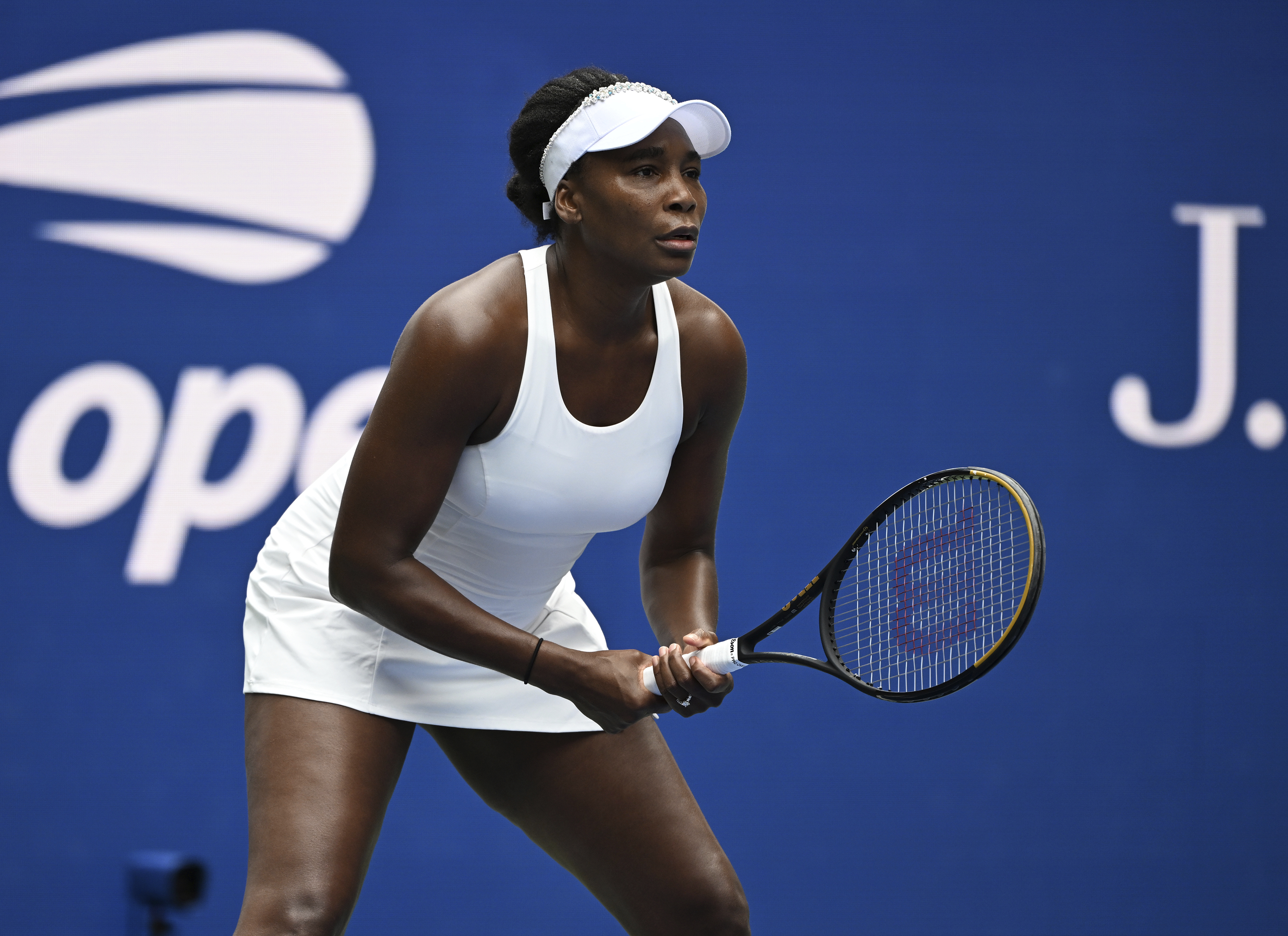 Venus Williams competed in the doubles match at the 2025 US Open in a white tennis dress from H&amp;amp;M