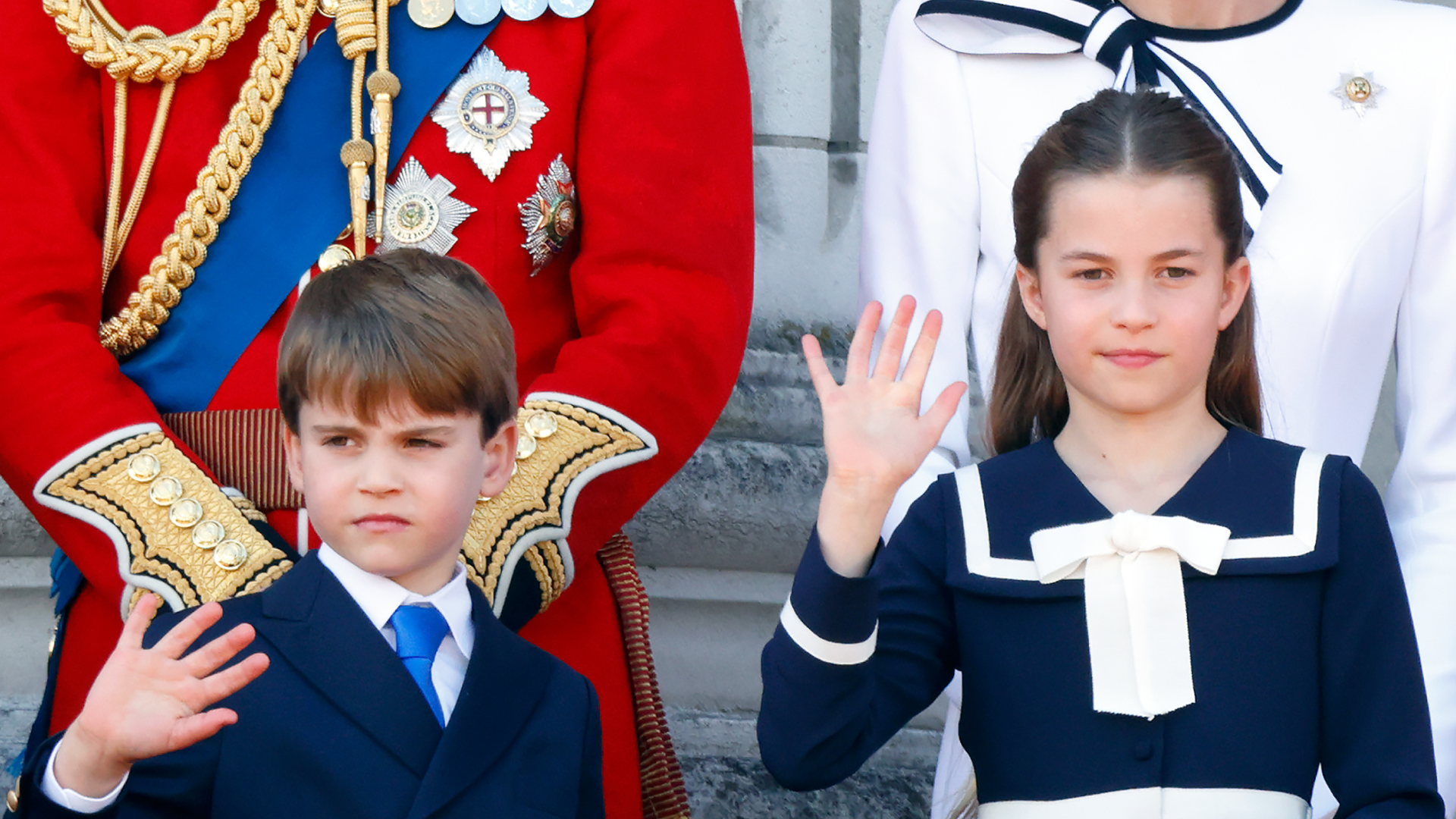 Prince Louis and Princess Charlotte waving