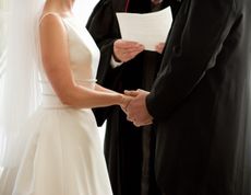 Cheeky groom confers with his ushers before deciding to say, ‘I do’ to his wife-to-be