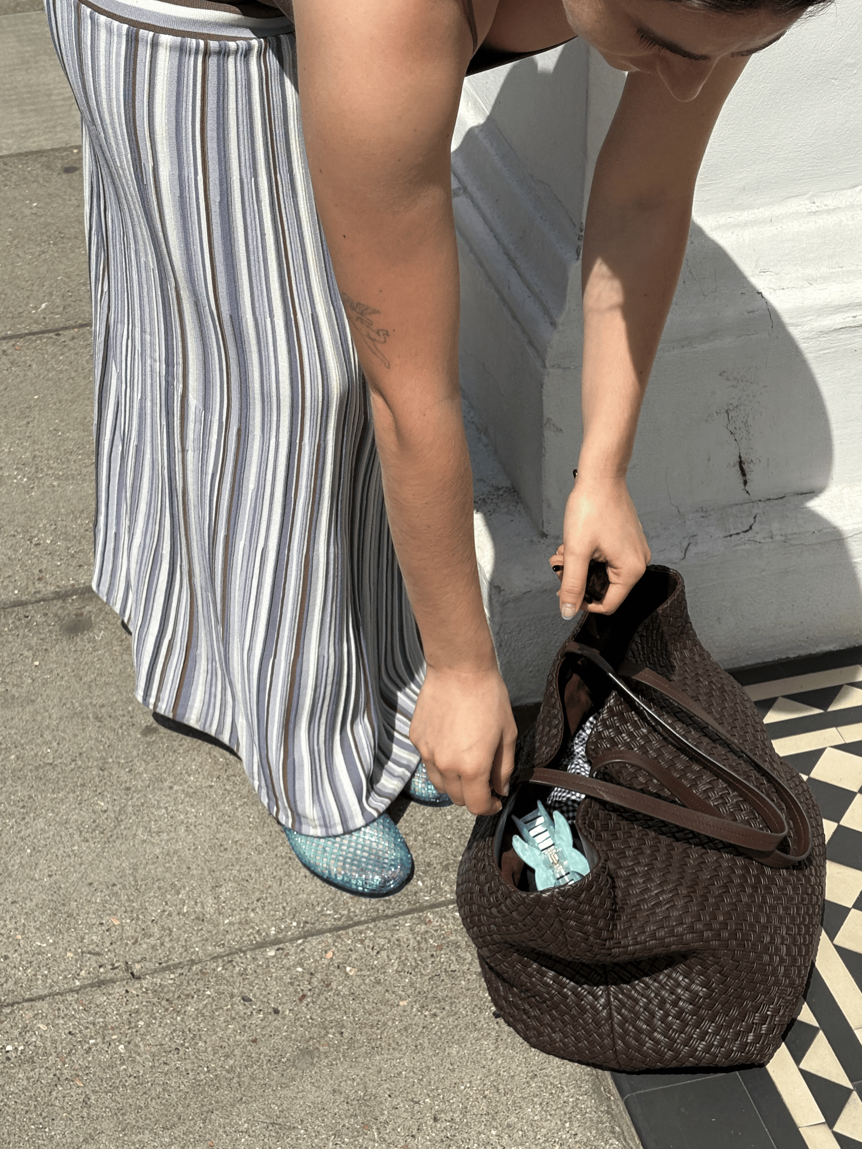 An image ofBest Knockoff Luxury Clothing
 UK's Ava Gilchrist wearing jelly sandals.