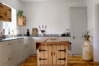 Rustic wood kitchen island in a grey shaker kitchen