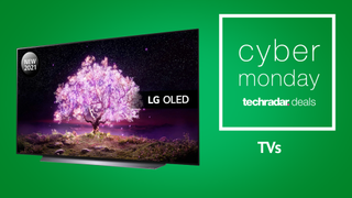 Cyber Monday 2021 TV deals - an LG OLED from this year showing a pink tree against the night sky