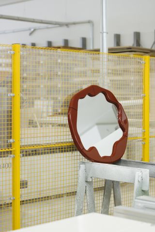 Round mirror in factory