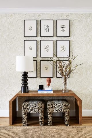gallery wall ideas with framed illustrations of faces